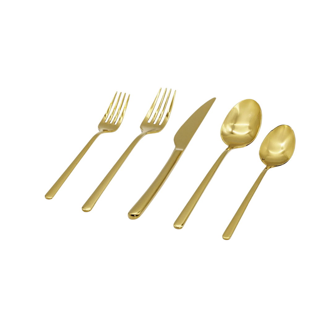 Five-piece gold-colored flatware set including a dinner fork, salad fork, knife, soup spoon, and teaspoon, arranged diagonally on a plain white background.