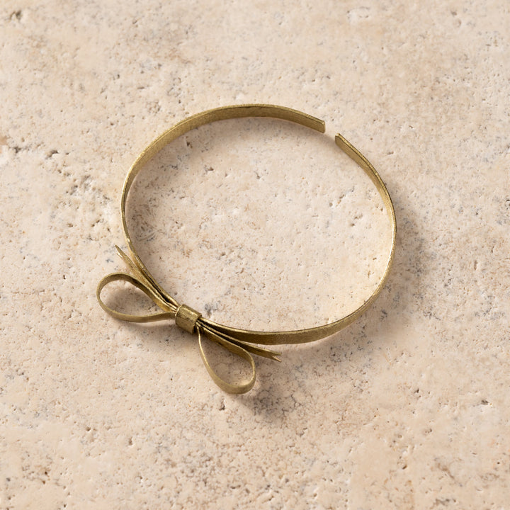 Handcrafted Bronze Bow Adjustable Bracelet, Fair Trade