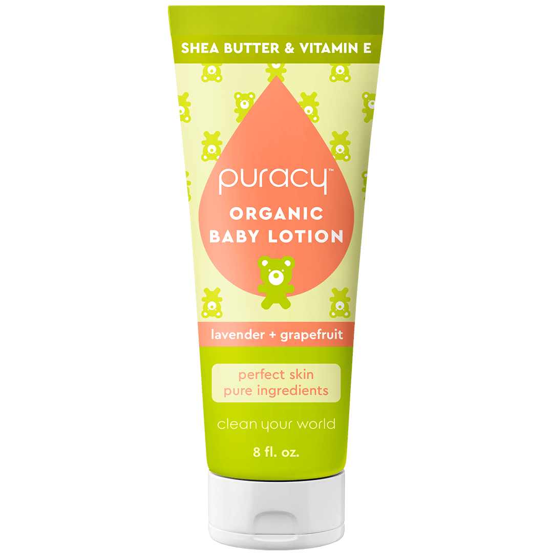 Puracy organic baby lotion tube on a green background