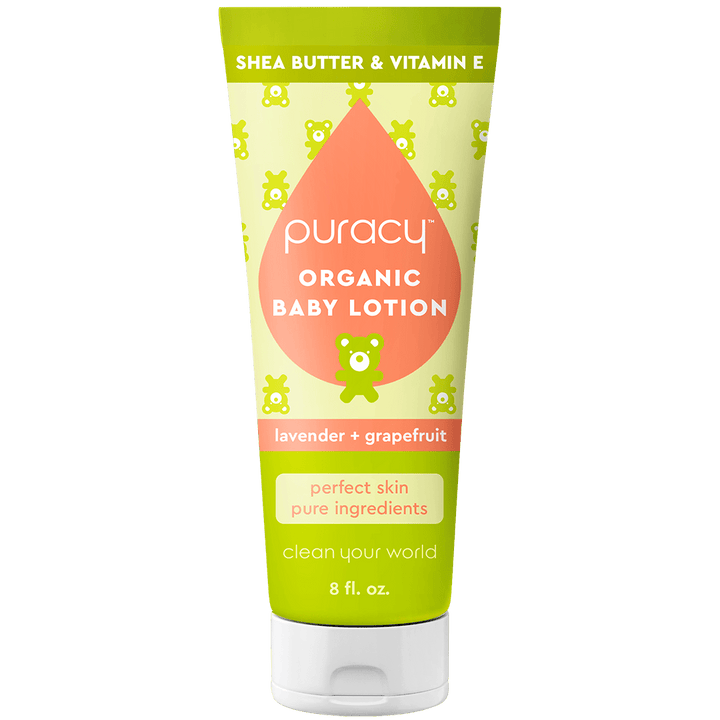 Puracy organic baby lotion tube on a green background
