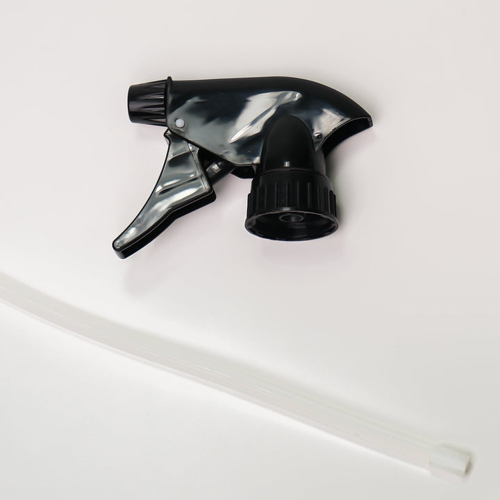 Black and clear spray nozzle on a white background