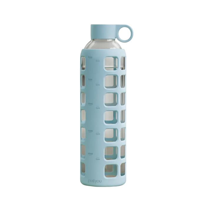 A light blue glass water bottle with a matching light blue protective sleeve featuring square cutouts and a loop handle on the cap, shown on a plain white background.