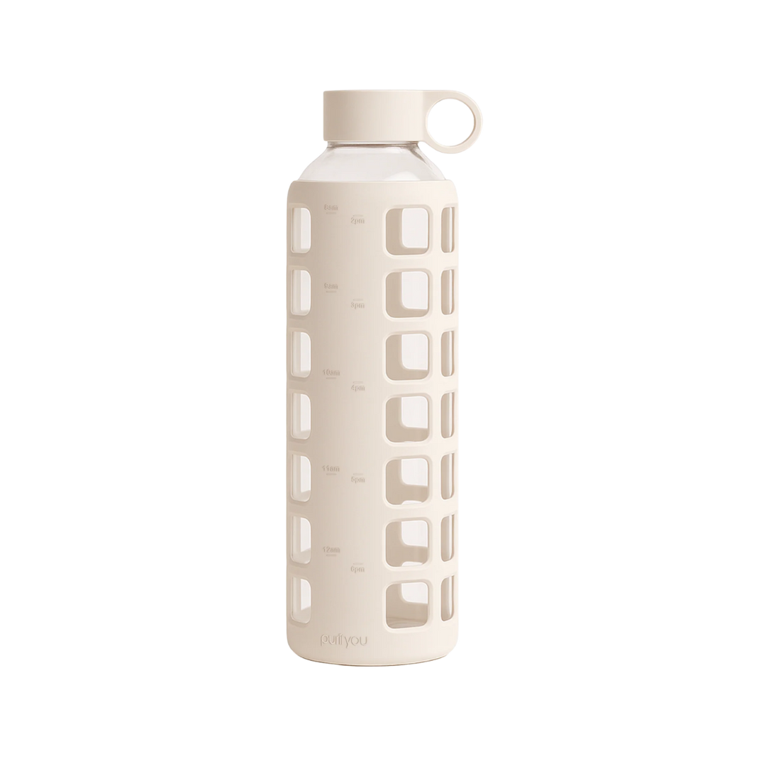 A tall, cylindrical water bottle with a light beige silicone sleeve featuring square cutouts, a matching beige cap, and a small loop handle, shown on a plain white background.
