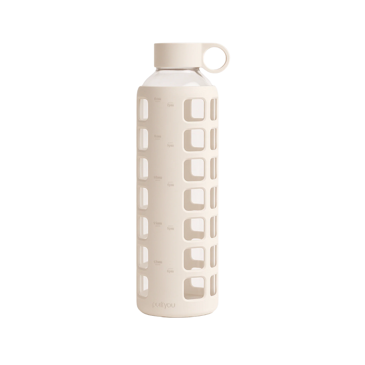 A tall, cylindrical water bottle with a light beige silicone sleeve featuring square cutouts, a matching beige cap, and a small loop handle, shown on a plain white background.
