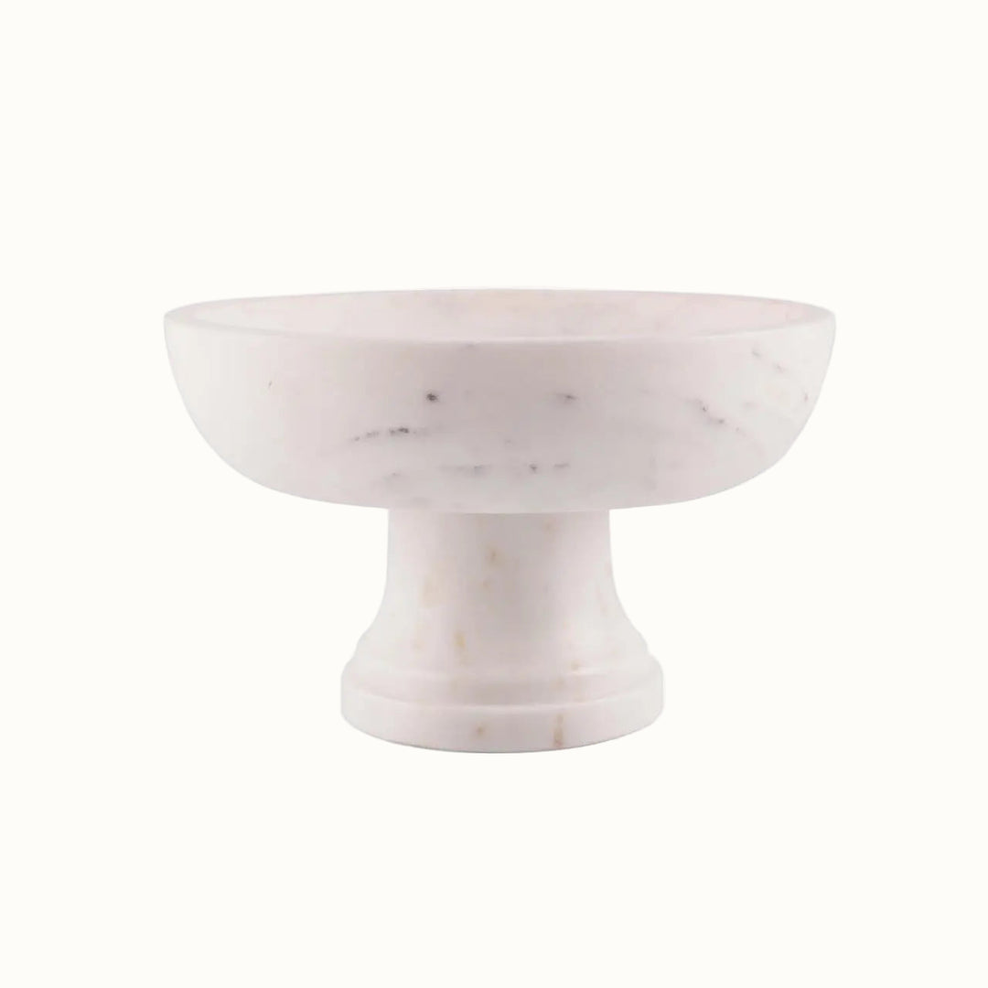 Marble cake stand on a white background