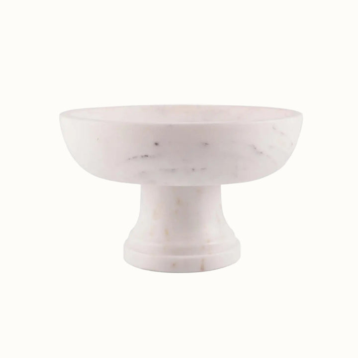Marble cake stand on a white background