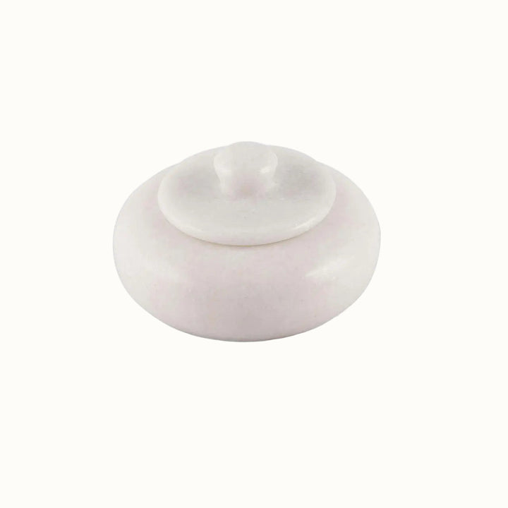 White marble salt cellar container on a white background
