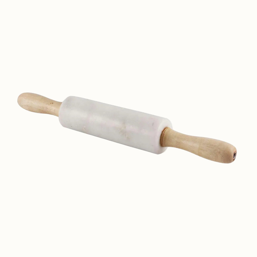Marble rolling pin with wooden handle on a white background