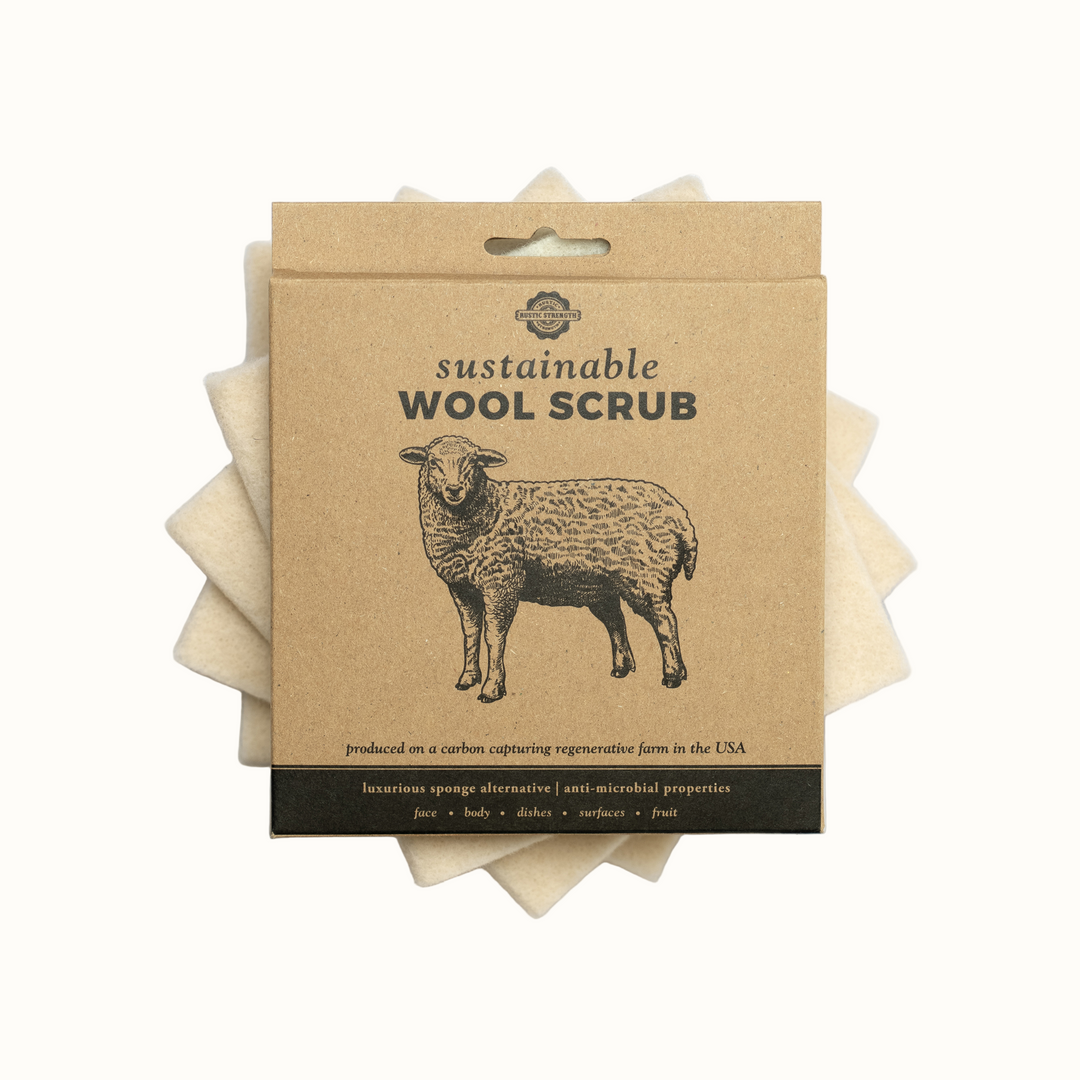 Packaged sustainable wool scrub with a sheep illustration on a white background
